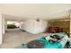 Covered outdoor entertaining space with kayak parking, and dinette at 5946 Bayou Grande Ne Blvd, St Petersburg, FL 33703