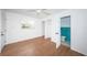 Bedroom with wood floors, closet and ensuite bathroom at 601 Paris S Ave, St Petersburg, FL 33701