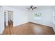 Spacious bedroom with wood-look floors and access to hallway at 601 Paris S Ave, St Petersburg, FL 33701