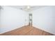 Spacious bedroom with wood floors and access to another room at 601 Paris S Ave, St Petersburg, FL 33701