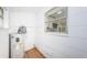 Laundry room with water heater and vinyl flooring at 601 Paris S Ave, St Petersburg, FL 33701