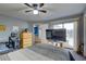 Spacious bedroom with a double bed, large TV and sliding door access at 6262 142Nd N Ave # 505, Clearwater, FL 33760