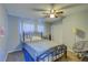 Bright bedroom with a double bed, ceiling fan and window at 6262 142Nd N Ave # 505, Clearwater, FL 33760