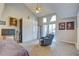 Spacious bedroom with large closet, recliner, and access to the patio at 6262 142Nd N Ave # 505, Clearwater, FL 33760
