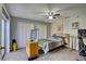 Cozy bedroom with a double bed, large TV, and ample closet space at 6262 142Nd N Ave # 505, Clearwater, FL 33760
