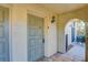 Front door entry to the townhome with tile flooring and access to a private patio at 6262 142Nd N Ave # 505, Clearwater, FL 33760