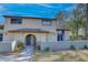 Two-story condo building exterior with walkway and landscaping at 6262 142Nd N Ave # 505, Clearwater, FL 33760