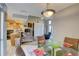 Open kitchen with wood cabinets, stainless steel appliances, and a breakfast bar at 6262 142Nd N Ave # 505, Clearwater, FL 33760