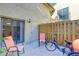 Private patio with seating area, bicycle, and fenced yard at 6262 142Nd N Ave # 505, Clearwater, FL 33760