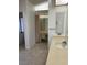 Main bathroom with double vanity and tiled floor at 702 Dorado Ct, Brandon, FL 33511