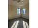 Cozy carpeted bedroom with large windows at 702 Dorado Ct, Brandon, FL 33511