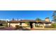 Single-story house with brown roof, red brick driveway, and palm trees at 702 Dorado Ct, Brandon, FL 33511