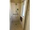 Walk-in shower with grab bars and fold-down seat at 702 Dorado Ct, Brandon, FL 33511