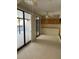 Sunroom with sliding glass doors and ceiling fan at 702 Dorado Ct, Brandon, FL 33511