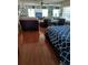 Combined living room and bedroom with hardwood floors at 8950 Park Blvd # 505, Seminole, FL 33777
