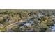 Aerial view of the house and surrounding neighborhood at 1890 San Mateo Dr, Dunedin, FL 34698