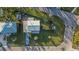 Aerial view showcasing the house's location and surrounding area at 1890 San Mateo Dr, Dunedin, FL 34698
