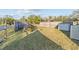 Backyard with wooden fence and storage unit at 1890 San Mateo Dr, Dunedin, FL 34698