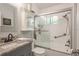 Updated bathroom with granite vanity and a shower/tub combo at 1890 San Mateo Dr, Dunedin, FL 34698