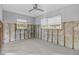 Another bedroom undergoing renovation, showing exposed walls at 1890 San Mateo Dr, Dunedin, FL 34698