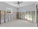 Bedroom under construction with exposed framing at 1890 San Mateo Dr, Dunedin, FL 34698