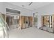 Large bedroom with exposed framing and flooring at 1890 San Mateo Dr, Dunedin, FL 34698