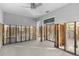 Open living space undergoing reconstruction with exposed walls at 1890 San Mateo Dr, Dunedin, FL 34698