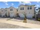 These new townhomes feature private attached garages and modern paved driveways at 2391 Summerlit St, Lutz, FL 33558