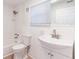 Bathroom featuring white subway tiles in the shower and beadboard paneling at 3424 Queensboro S Ave, St Petersburg, FL 33711