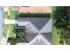 Aerial view of home with gray roof and landscaped yard at 3466 Maclaren Dr, Palm Harbor, FL 34684