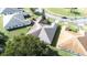 Aerial view of neighborhood with various roof styles at 3466 Maclaren Dr, Palm Harbor, FL 34684