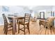 Casual dining area with a wooden table and four chairs at 3466 Maclaren Dr, Palm Harbor, FL 34684