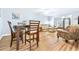 Small dining area with a wooden table and four chairs at 3466 Maclaren Dr, Palm Harbor, FL 34684