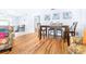 Bright dining area with a wooden table and four chairs at 3466 Maclaren Dr, Palm Harbor, FL 34684