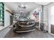 Garage with car, shelving and additional storage at 3466 Maclaren Dr, Palm Harbor, FL 34684