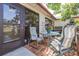 Cozy patio with seating, perfect for outdoor relaxation and entertaining at 3466 Maclaren Dr, Palm Harbor, FL 34684