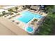Large community pool with a spa and lounge chairs at 3466 Maclaren Dr, Palm Harbor, FL 34684