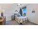 Cozy bedroom with a rustic feel and a view at 3515 Thistle Bank Ct, Plant City, FL 33565