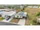 Aerial view of the home, showing its location in a neighborhood at 37340 Neukom Ave, Zephyrhills, FL 33541