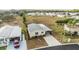 Aerial view of a mobile home community with a home and surrounding landscape at 37340 Neukom Ave, Zephyrhills, FL 33541