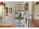 Front door view shows access to covered porch and backyard at 37340 Neukom Ave, Zephyrhills, FL 33541