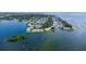 Aerial view of waterfront community showcasing the beautiful landscape and serene water views, perfect for coastal living at 4827 Coquina Key Se Dr # B, St Petersburg, FL 33705