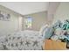 Relaxing bedroom with soothing decor and a comfortable starfish patterned bed at 4827 Coquina Key Se Dr # B, St Petersburg, FL 33705