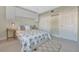 Charming bedroom featuring built-in storage, a comfortable bed, and cozy decor at 4827 Coquina Key Se Dr # B, St Petersburg, FL 33705