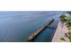 Expansive dock featuring deep-water access and direct waterfront views from this stunning property at 4827 Coquina Key Se Dr # B, St Petersburg, FL 33705