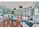 Bright and airy lounge featuring plush seating, elegant decor, and expansive windows with views of the waterfront at 4827 Coquina Key Se Dr # B, St Petersburg, FL 33705