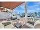 Comfortable seating on a relaxing patio overlooking a marina at 4827 Coquina Key Se Dr # B, St Petersburg, FL 33705