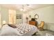 Bright bedroom with a view of the kitchen and bathroom at 9404 Rockbridge Cir # 9404, New Port Richey, FL 34655