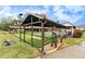 Community bocce ball court with covered seating at 9404 Rockbridge Cir # 9404, New Port Richey, FL 34655