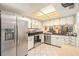 Updated kitchen featuring stainless steel appliances and ample counter space at 9404 Rockbridge Cir # 9404, New Port Richey, FL 34655